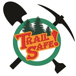 Pick and shovel crossed behind trees to form logo for Ice Age Trail safety program